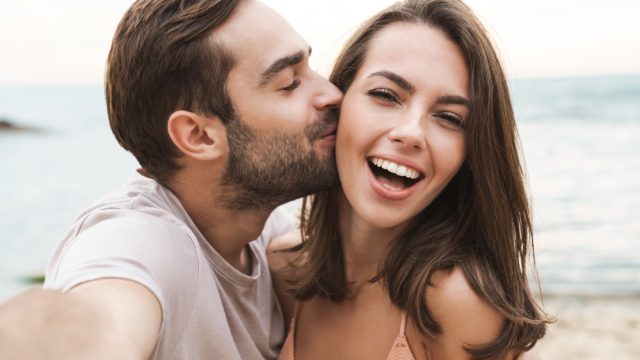 Image,Of,Young,Happy,Man,Kissing,And,Hugging,Beautiful,Woman