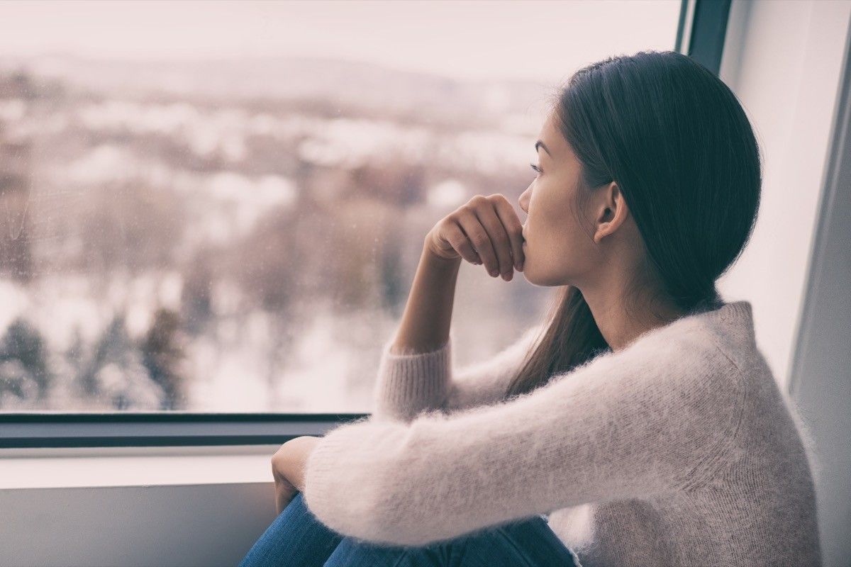 Woman Staring out the Window