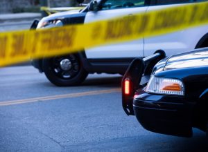 police tape and police cars