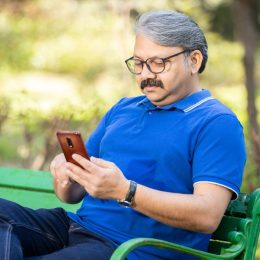 senior man using android smartphone