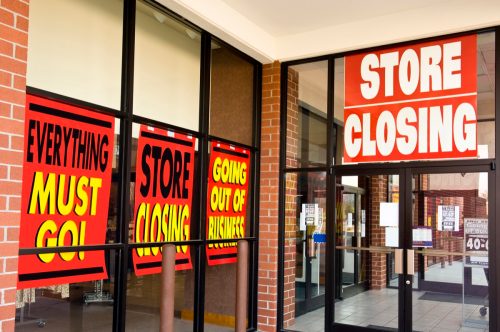 store closing signs in window