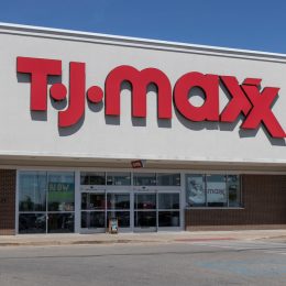 A T.J. Maxx storefront photographed from a parking lot