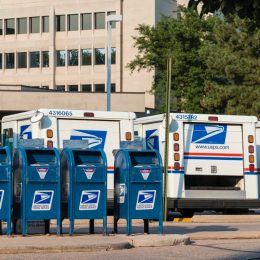 Delivery vehicles parked at the United States Post Office in downtown Fort Collins. With almost 600,000 employees, the United States Postal Service is the second largest civilian employer in the United States.