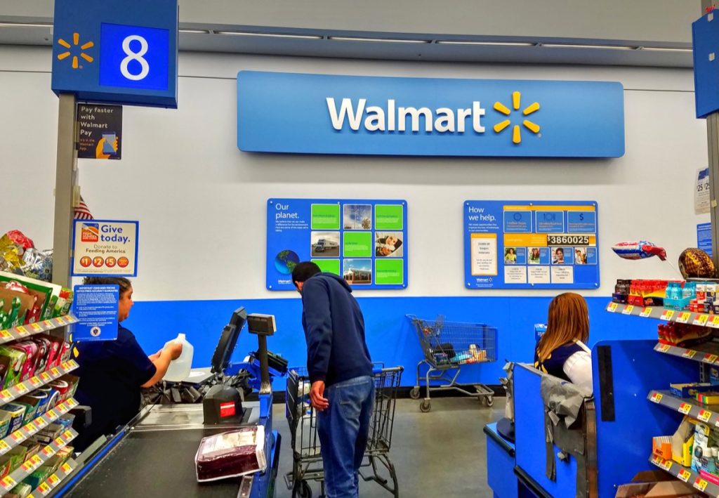 HDR image, Walmart check out lane, cash register paying customer, shopping cart - Saugus, Massachusetts USA - April 2, 2018