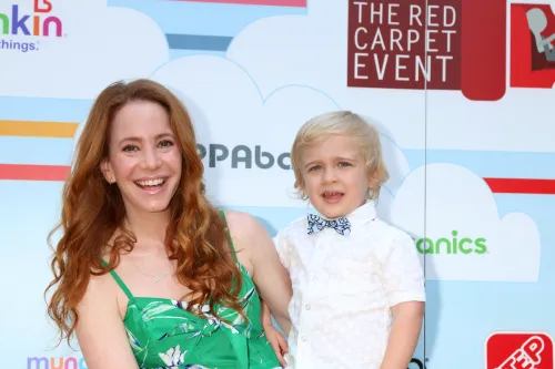 Amy Davidson and son Lennox at the Celebrity Red CARpet Event in 2018