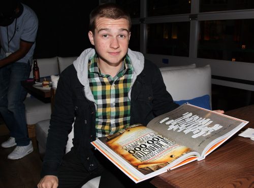 Angus T. Jones at a reception for Chuck Lorre's "What Doesn't Kill Us Makes Us Bitter" in 2012