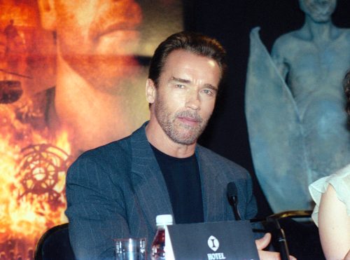 Arnold Schwarzenegger at a press conference for "End of Days" in 1999