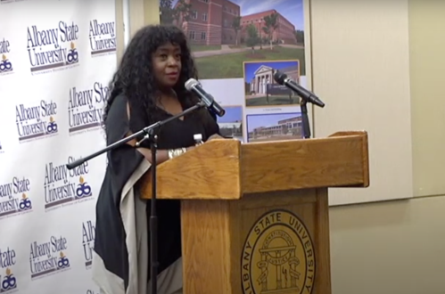 Charnele Brown giving a speech at Albany State University in 2019