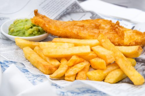 Traditional English Food such as Fish and Chips with mushy peas served in the Pub or Restaurant