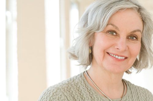 woman with gray hair in a layered bob cut