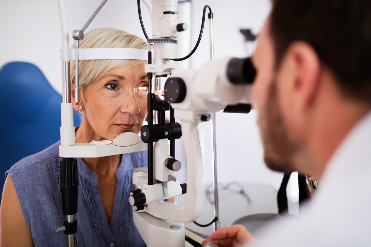Eye doctor examining a patient.