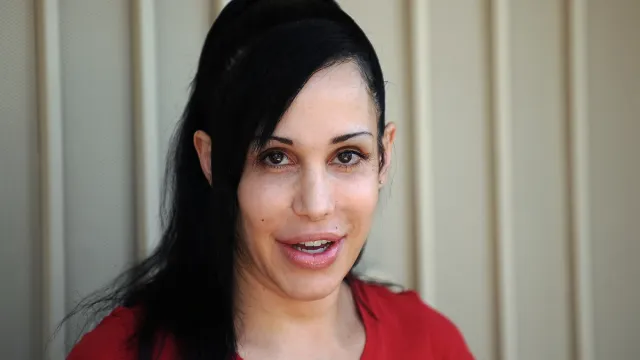 Nadya Suleman in front of her home in La Habra, California in 2010
