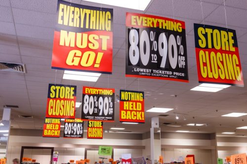 Store Closing and huge discount signs displayed at a soon to be out of business Carsons, a subsidiary of The Bon-Ton I
