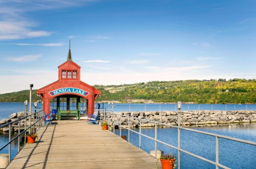 A pier with a little red structure overlooking Seneca Lake in upstate New York.