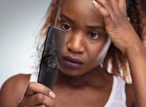woman losing hair