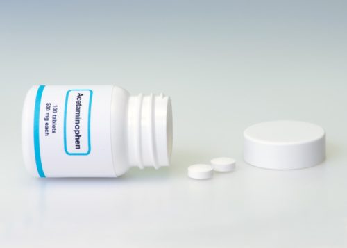 acetaminophen bottle and pills