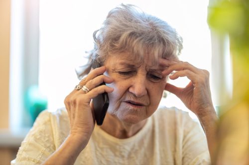 Older Woman Looking Confused While on the Phone