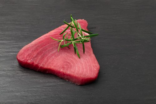 Tuna Steak on Black Countertop