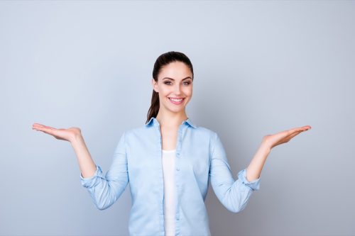 Woman Holding Her Hands Up for Two Options