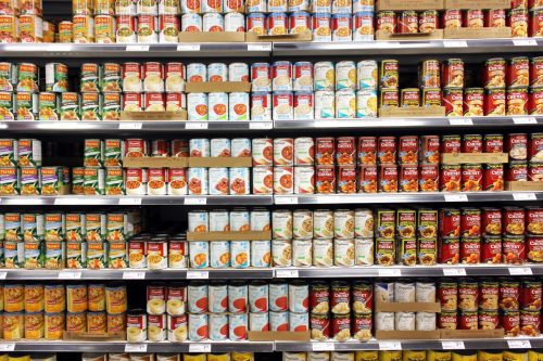 Canned food products in a supermarket. Canned foods consumption has declined in North America as the economy improves and consumers spending more on fresher food items.