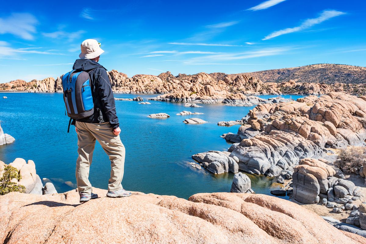 A hiker at Watson Lake in Prescott, Arizona USA
