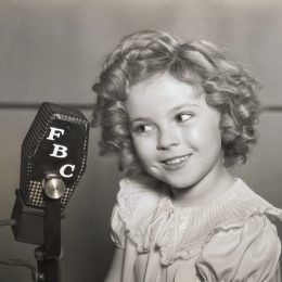 Shirley Temple with microphone