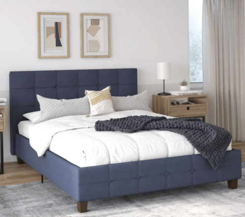 Desert Fields Rose Upholstered Platform Bed shown in navy blue in a nicely decorated bedroom