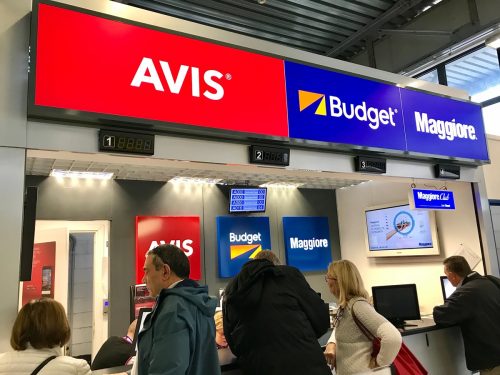 The Avis car rental counter at the airport.