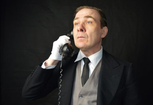 Butler on phone