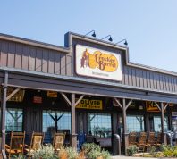 A store front sign for the restaurant chain known as Cracker Barrel.