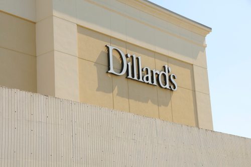 The logo of a Dillard's department store is seen on a clear, blue sky day.  Dillard's was started in 1938 in Nashville, Arkansas and today has an app