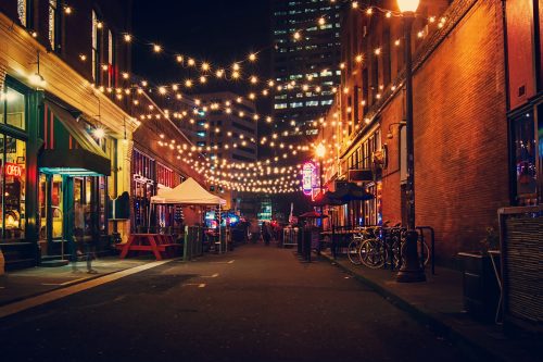 things to do in downtown portland - street at night with hanging lights