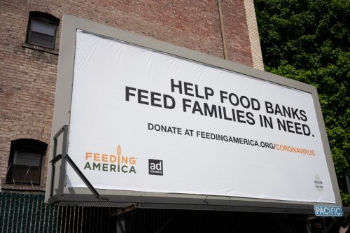 Feeding America billboard is seen in downtown Portland, Oregon, during the COVID pandemic. Feeding America is a nonprofit with a nationwide network of food banks.