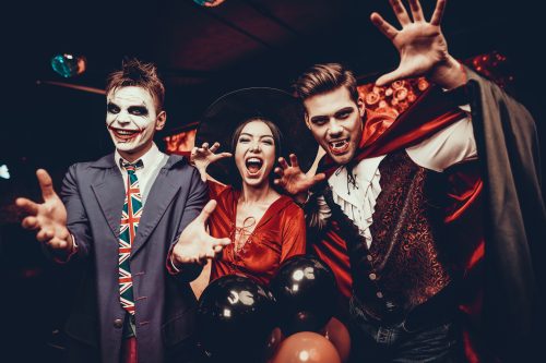 halloween jokes for adults - people at halloween party