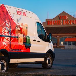 A rented Home Depot van approaching the store.