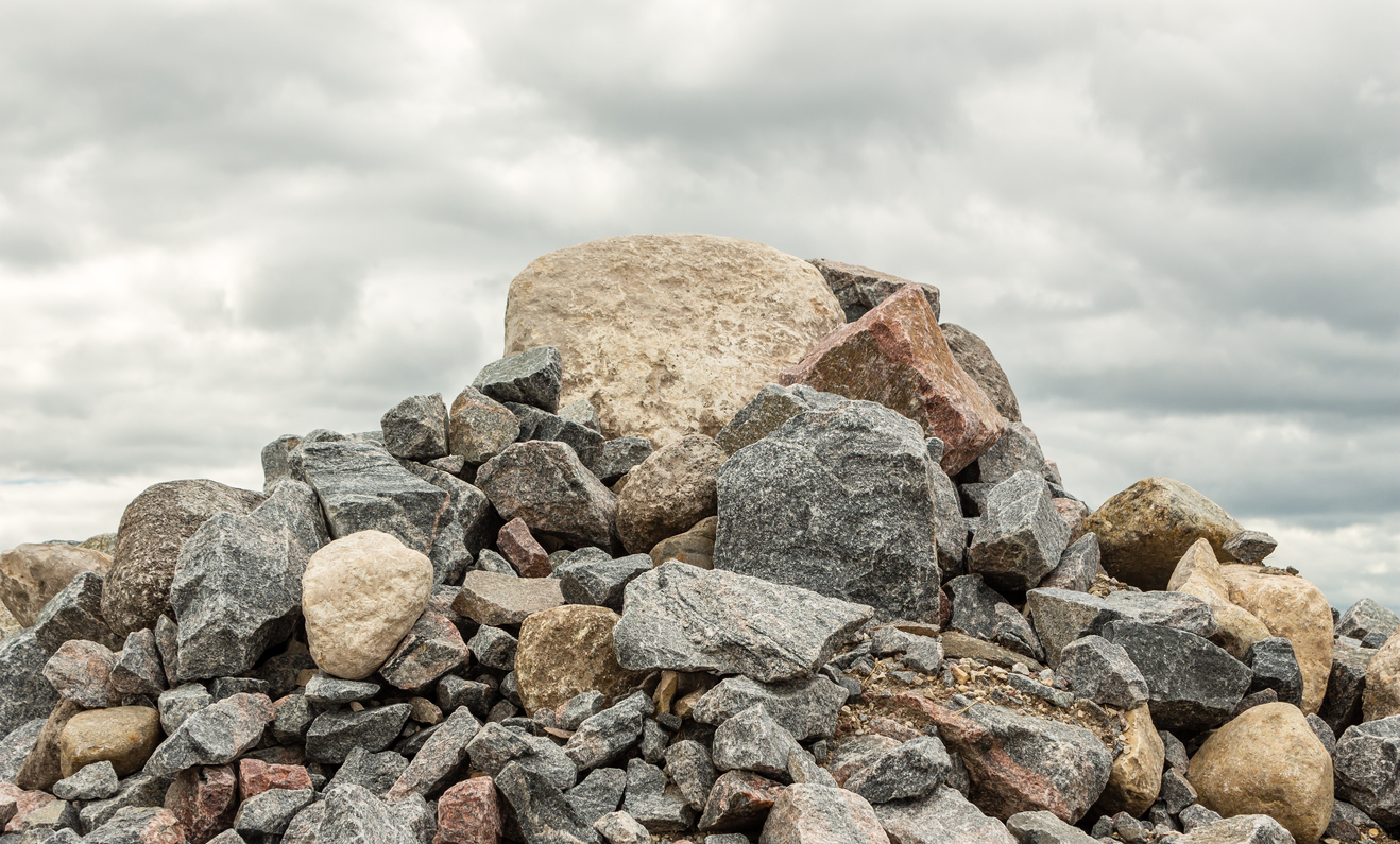 A boulder piled up with rocks.