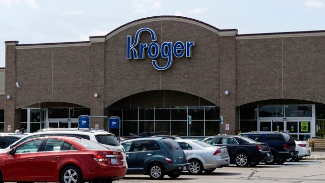People entering the Kroger store on Dequindre Road in Shelby Township, Michigan. Kroger is a chain of grocery stores founded by Bernard Kroger in 1883 with over 3600 locations nationwide.