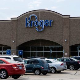 People entering the Kroger store on Dequindre Road in Shelby Township, Michigan. Kroger is a chain of grocery stores founded by Bernard Kroger in 1883 with over 3600 locations nationwide.