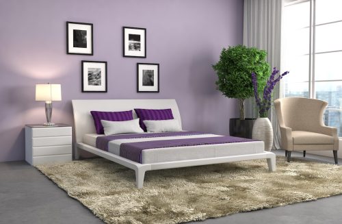 A modern bedroom painted a lavender color
