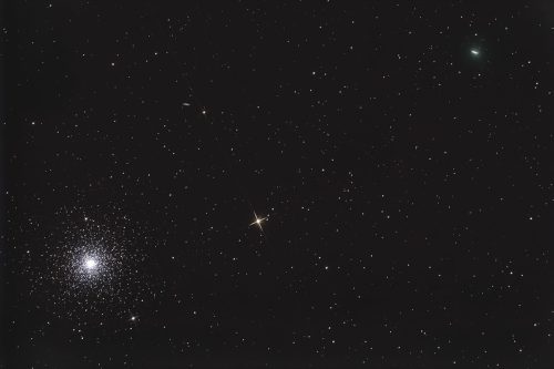 Comet C 2020 T2 Palomar next to the M3 star cluster, in the night sky.
