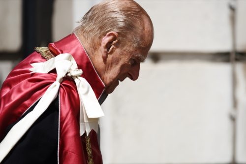 His RoyalPrince Philip accompanies Her Majesty The Queen who's attending a service at St Paul's Cathedral to mark the one hundredth anniversary of the Order.