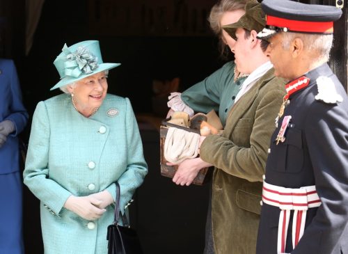 The Queen arrives to visit a replica of one of the original Sainsbury's to celebrate Sainsbury's 150th years in Covent garden in London, England.
