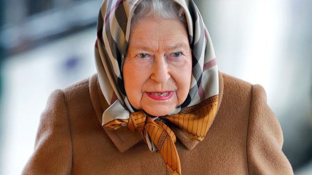 Queen Elizabeth II wearing headscarf.