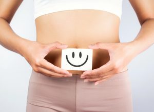 Smiley Face in Front of Stomach