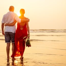 couple romantic walk on the beach