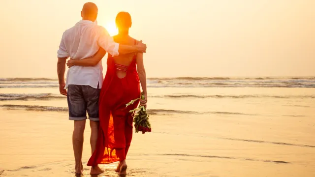 couple romantic walk on the beach