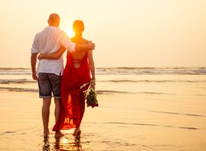 couple romantic walk on the beach