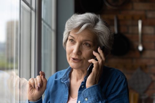 older woman on the phone