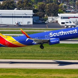 A Southwest Airlines plane taking off from the runway at an airport