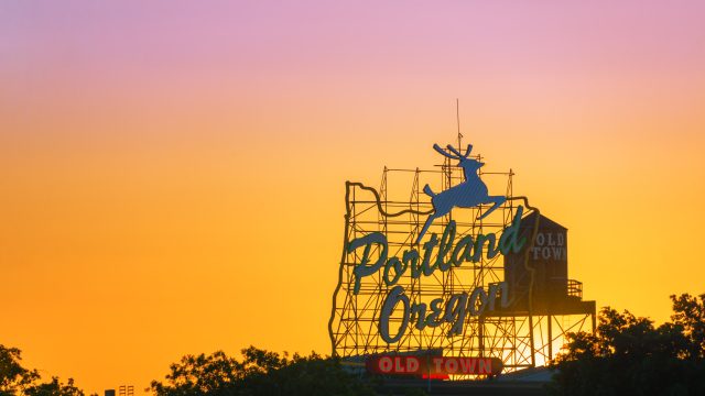 things to do in portland - sunset over city sign